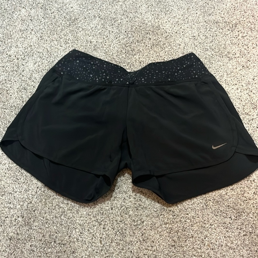 Nike dri-fit running shorts. Built in panties. Drawstring. Zipper pocket on back